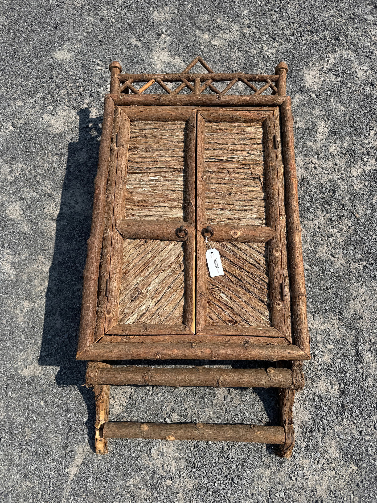 Adirondack Cedar Boathouse Cabinet: Approximately 4' tall x 24" wide. As found condition, bottom towel bar needs to be re-fastened. From the boathouse at Camp Deerlands, Whitney Park.