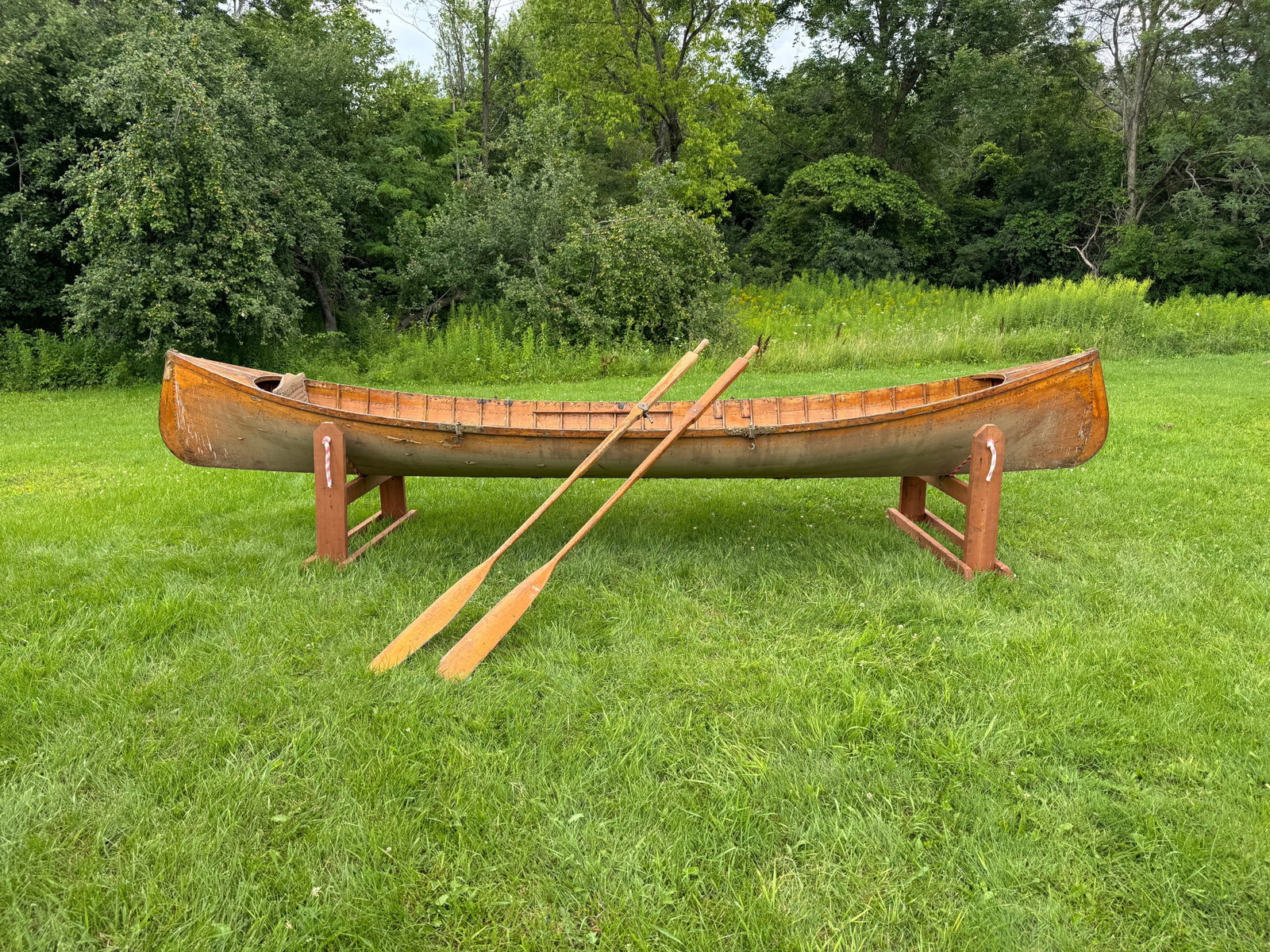 Adirondack Guideboat - 15 1/2" long: Natural finish inside and out., includes oars. Solid boat that needs to be cleaned and refinished.. Seats need work. Marked G9 from Whitney Park, Adirondacks.