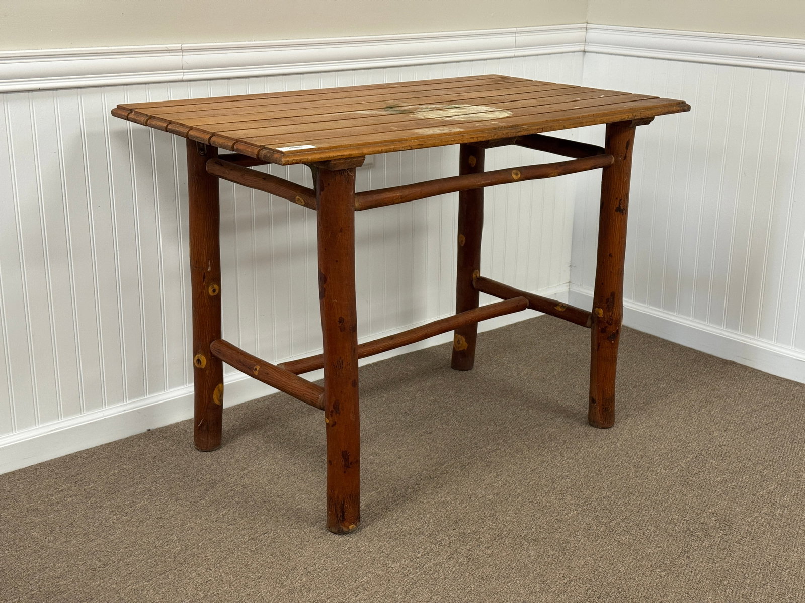 Old Hickory Branded Patio Table w/ Slat Top: 42" x 24" x 30" tall. Top needs refinishing, has water stains. From Camp Togus, Whitney Park.