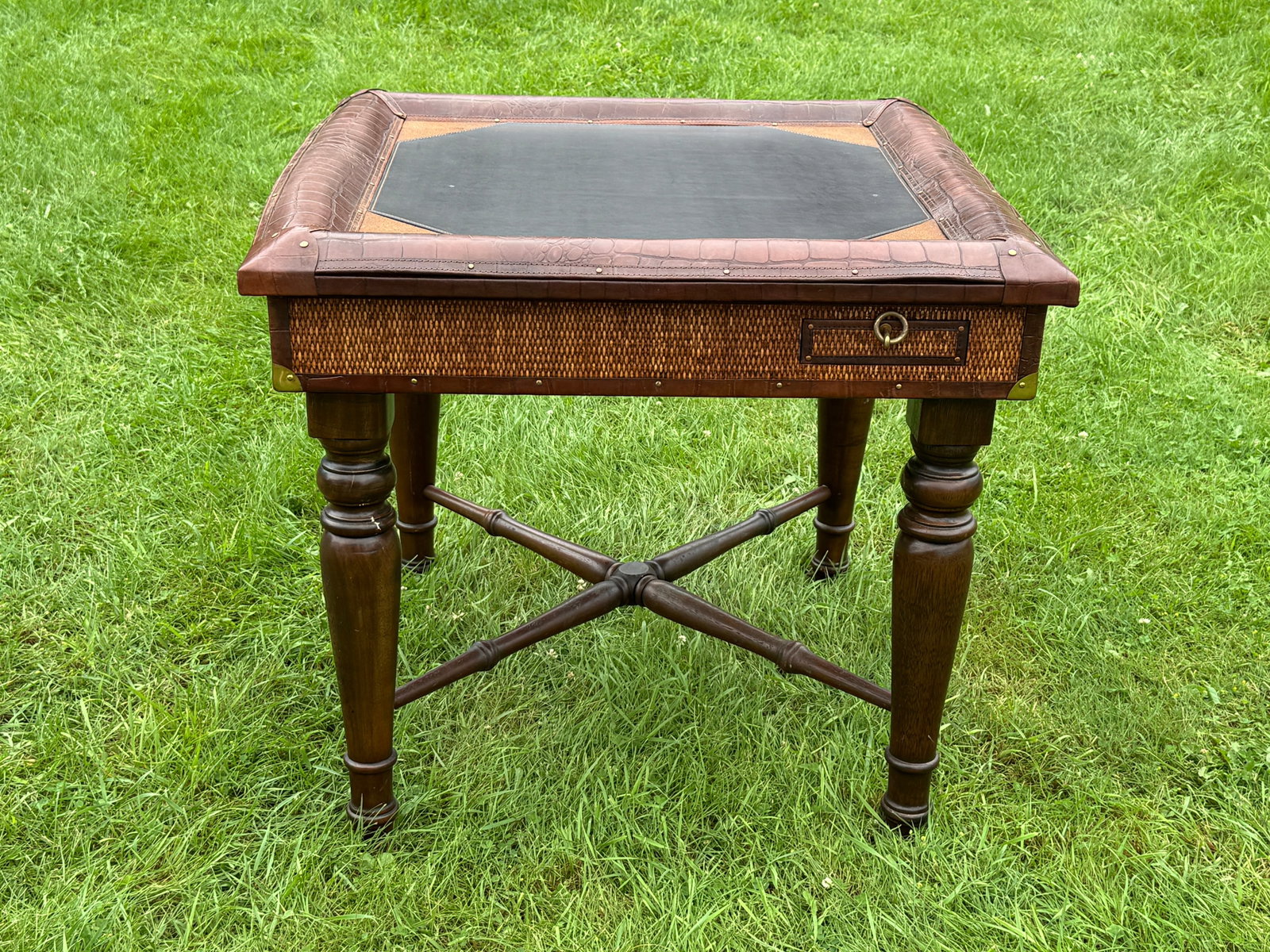 Stiles Brothers Mahogany Game Table: contemporary poker table with woven rattan top and brass accents. Some tacks around leather border are loose. 34" square, 31" tall. From Camp Deerlands, Whitney Park.