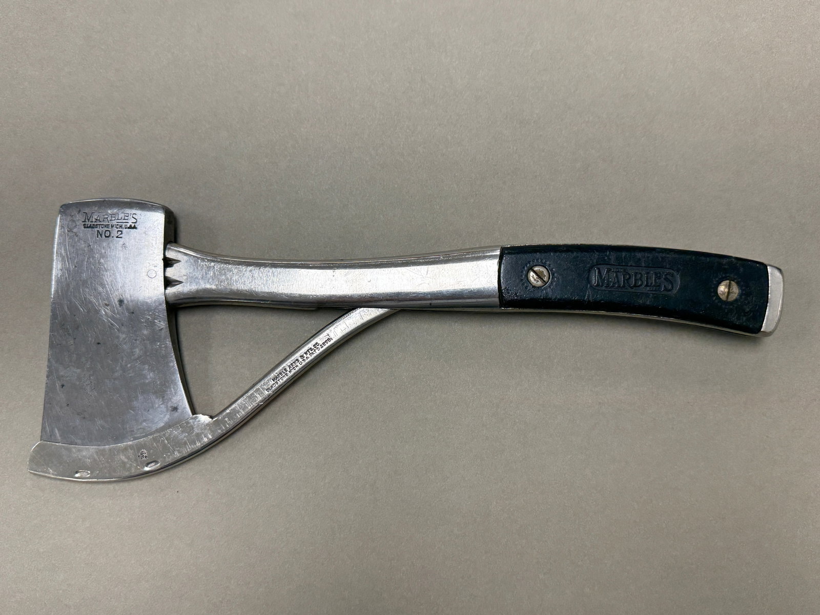 Marbles No. 2 Camp Ax: with spring loaded guard. 11" long.