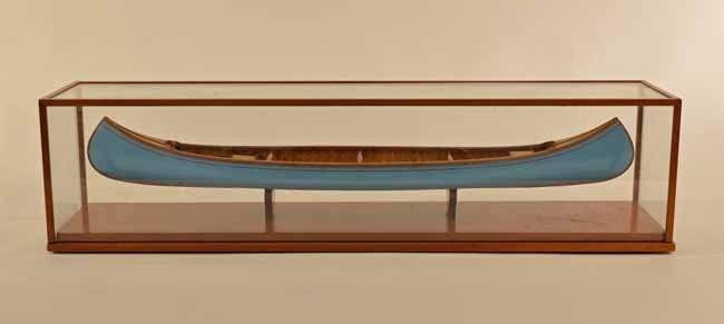 Old Town Model Wood Canvas Canoe by Dave Kavner: Keene, NY. 27 inches long with 2 paddles in a cherry, painted blue and in a glass display case