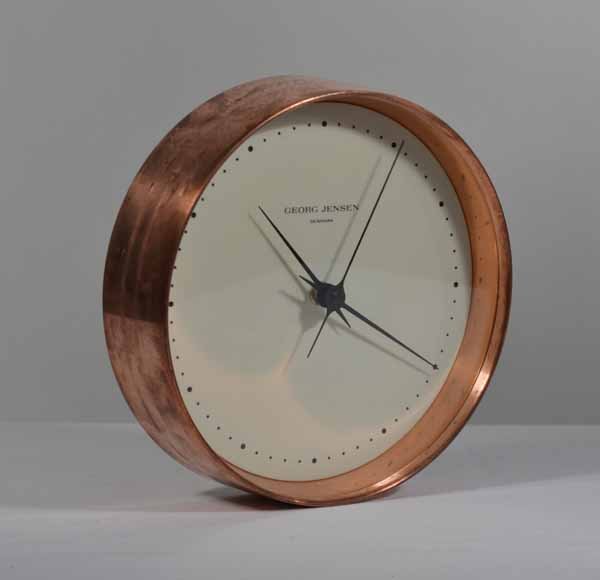 Georg Jensen, Denmark, Copper Wall Clock: Battery Powered. 1970's. 8 1/2 inches in diameter and 2 1/2 inches deep