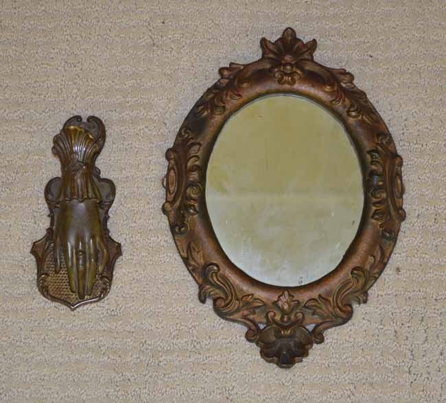 Hand Bill Clip and an Oval Mirror: hand clip marked T & E Ratcliff, Birmingham. Along with a small oval mirror in a cast metal frame.