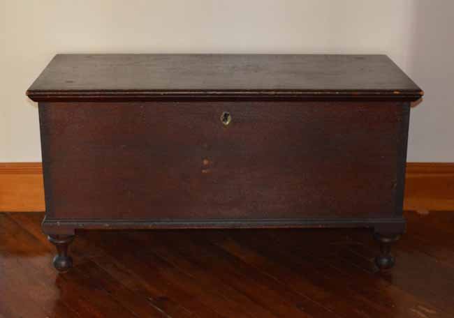 Pennsylvannia Ball Footed Red Blanket Box: 6 board dovetailed construction, good original red paint with a crackled finish, working lock and key, interior till and 2 small drawers. Some scuff marks to finish. 19 1/2" x 22 1/2" x 43"