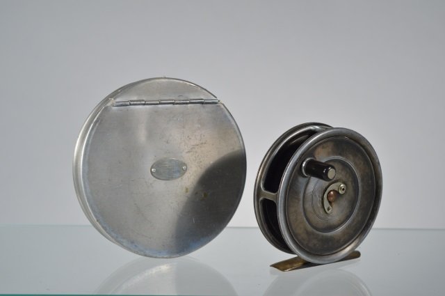 Hardy Brothers "Uniqua" Fly Reel: 3 1/8 inch diameter. Comes with a Hardy Brothers aluminum hinged leader box. From the Andy Reece Estate, longtime Western NY collector.