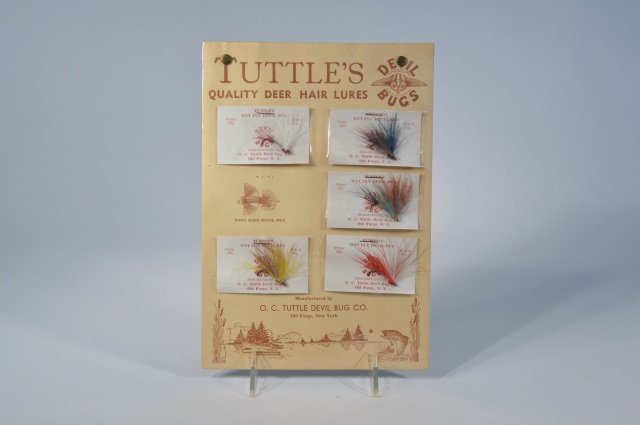 O.C. Tuttle Lure Store Display: Devil Bug Co. 5 original flies on cardboard store display. 7" x 10".. From the Andy Reece Estate, longtime Western NY collector.