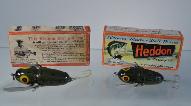 Two Heddon Crazy Crawlers Fishing Lures: both in new condition in original boxes. Same color pattern, 2 different sizes. Box number 2100BF and 2120BF. From the Andy Reece Estate, longtime Western NY collector.