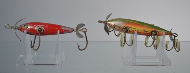 Two Early Wooden Lures: one is a pfleuger monarch minnow, unsure of maker on the other lure.