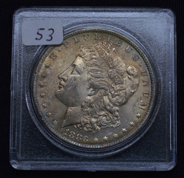 1883-O US Morgan Silver Dollar (1 of 2)