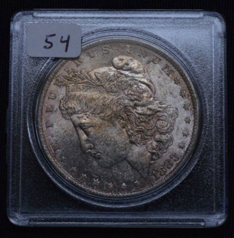 1883-O US Morgan Silver Dollar (1 of 2)