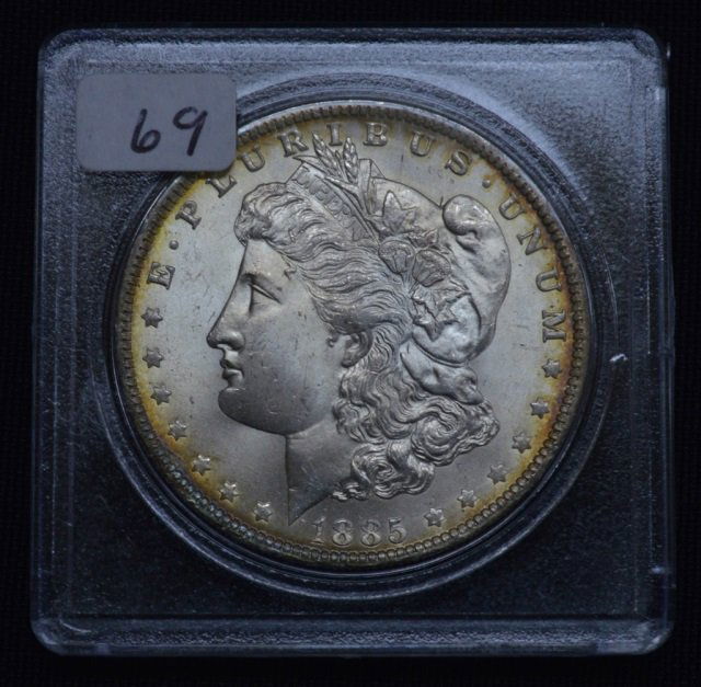 1885-O US Morgan Silver Dollar (1 of 2)
