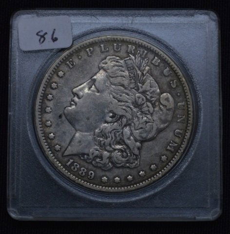 1889-O US Morgan Silver Dollar (1 of 2)