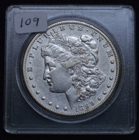 1899-O US Morgan Silver Dollar (1 of 2)