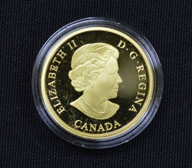 2005 Canadian $100 Gold Coin - 14kt - 12 grams: "The 130th Anniversary of the Establishment of the Supreme Court of Canada" in display case / box
