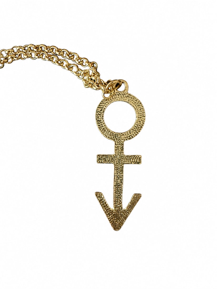 Prince - Personally Owned and Worn Original Symbol Necklace: An early version of the love symbol necklace personally owned and worn by Prince Rogers Nelson 'Prince'. Similar to the one in the listing photos. This originates from a collection of Prince's brother