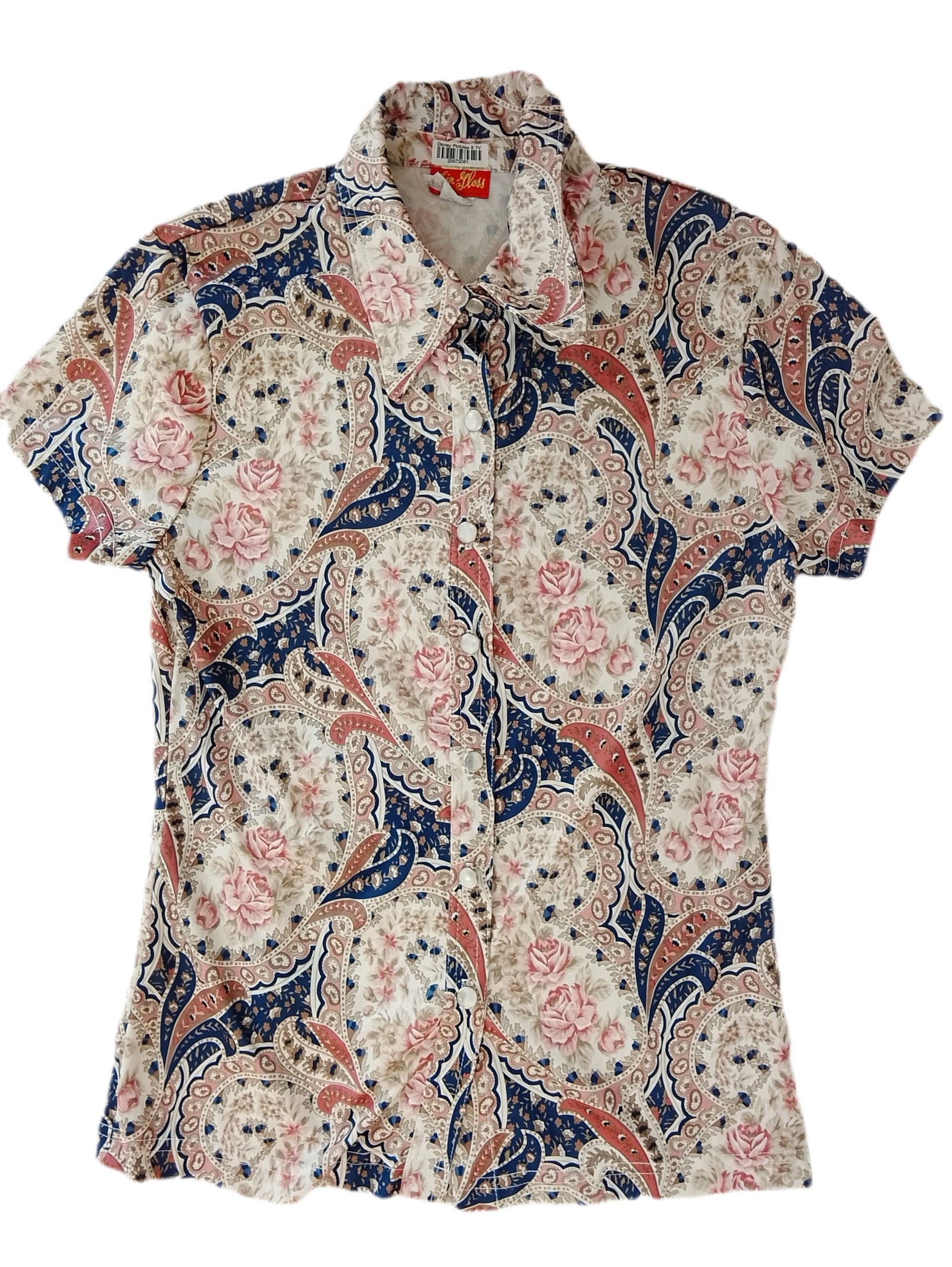 Britney Spears Owned & Worn Paisley Patterned Shirt: This Paisley patterned shirt was previously owned and worn by Britney Spears. The shirt contains a label in the collar stating that it was the Property of 'Disney Pictures & TV'. Britney's first m