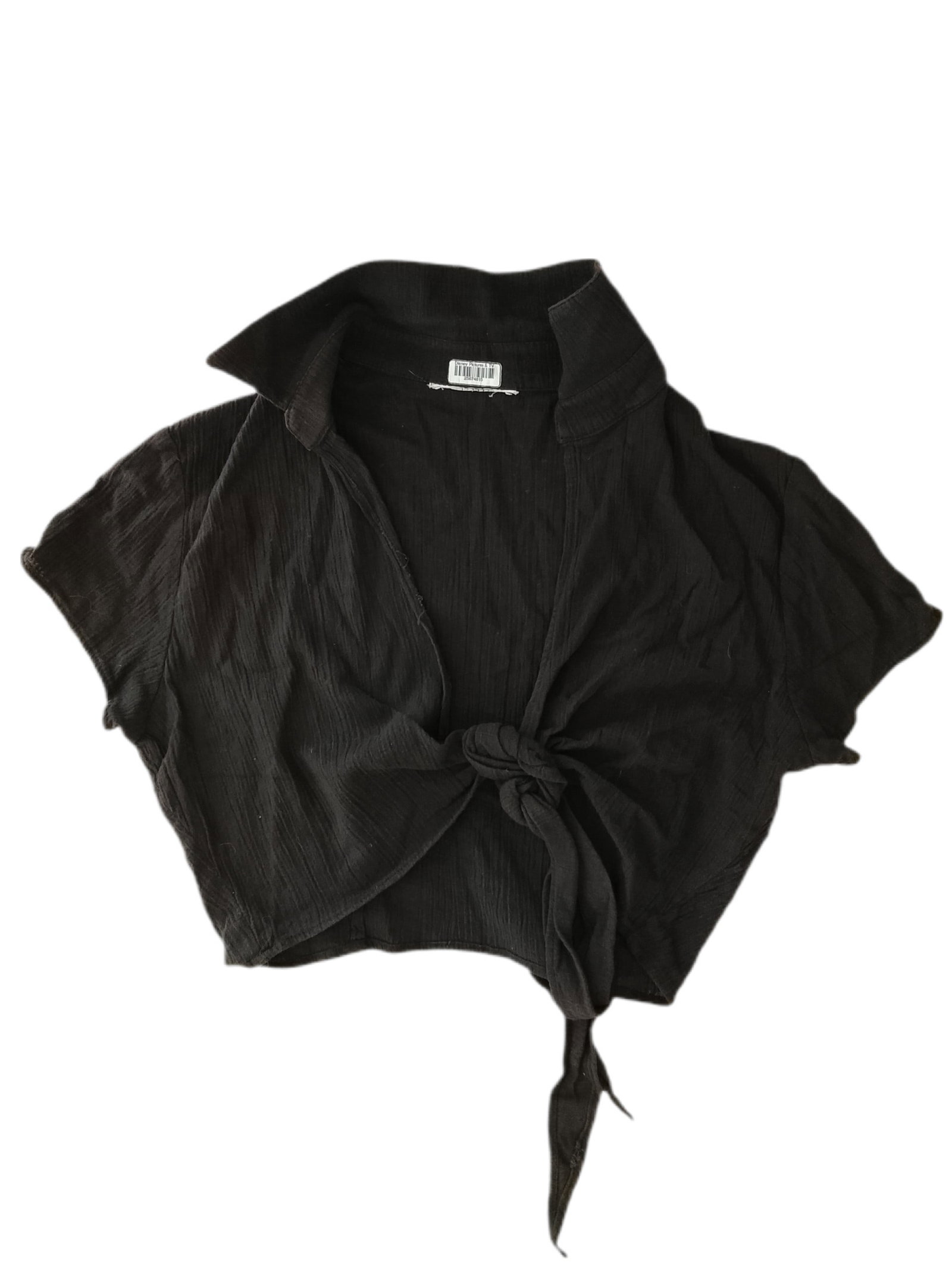 Britney Spears Owned & Worn Black Shirt: This black shirt was previously owned and worn by Britney Spears. The shirt contains a label in the collar stating that it was the Property of 'Disney Pictures & TV'. Britney's first major televis