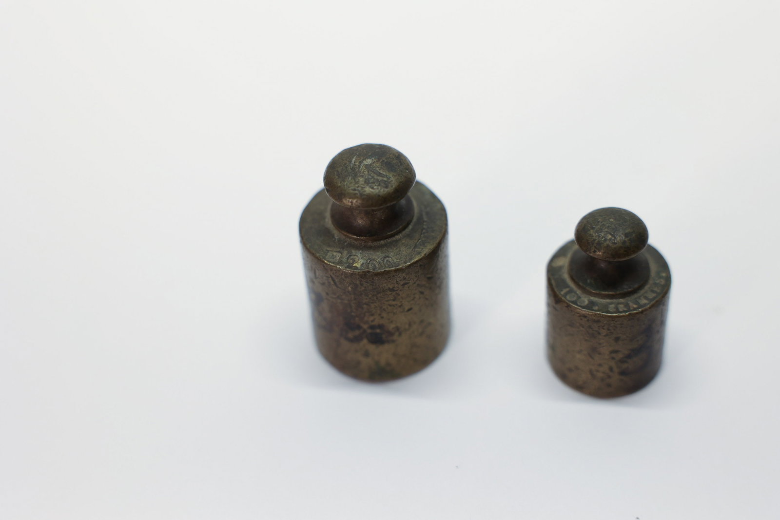 2 Brass Weights - 4