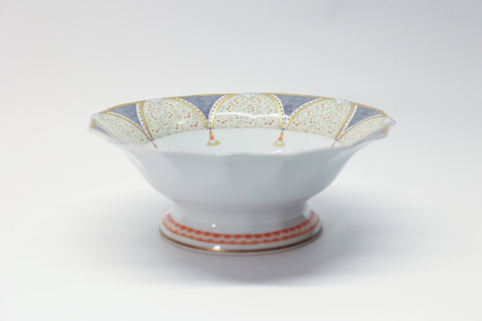 Royal Copenhagen Fairytale Grey Footed Dish 577: Designed by Finn Næss-Schmidt in the 1990s for Royal Copenhagen. Drawings for the transferware were designed by Jørgen Nielsen.Dimensions: H: 3.5", W: 9.5"