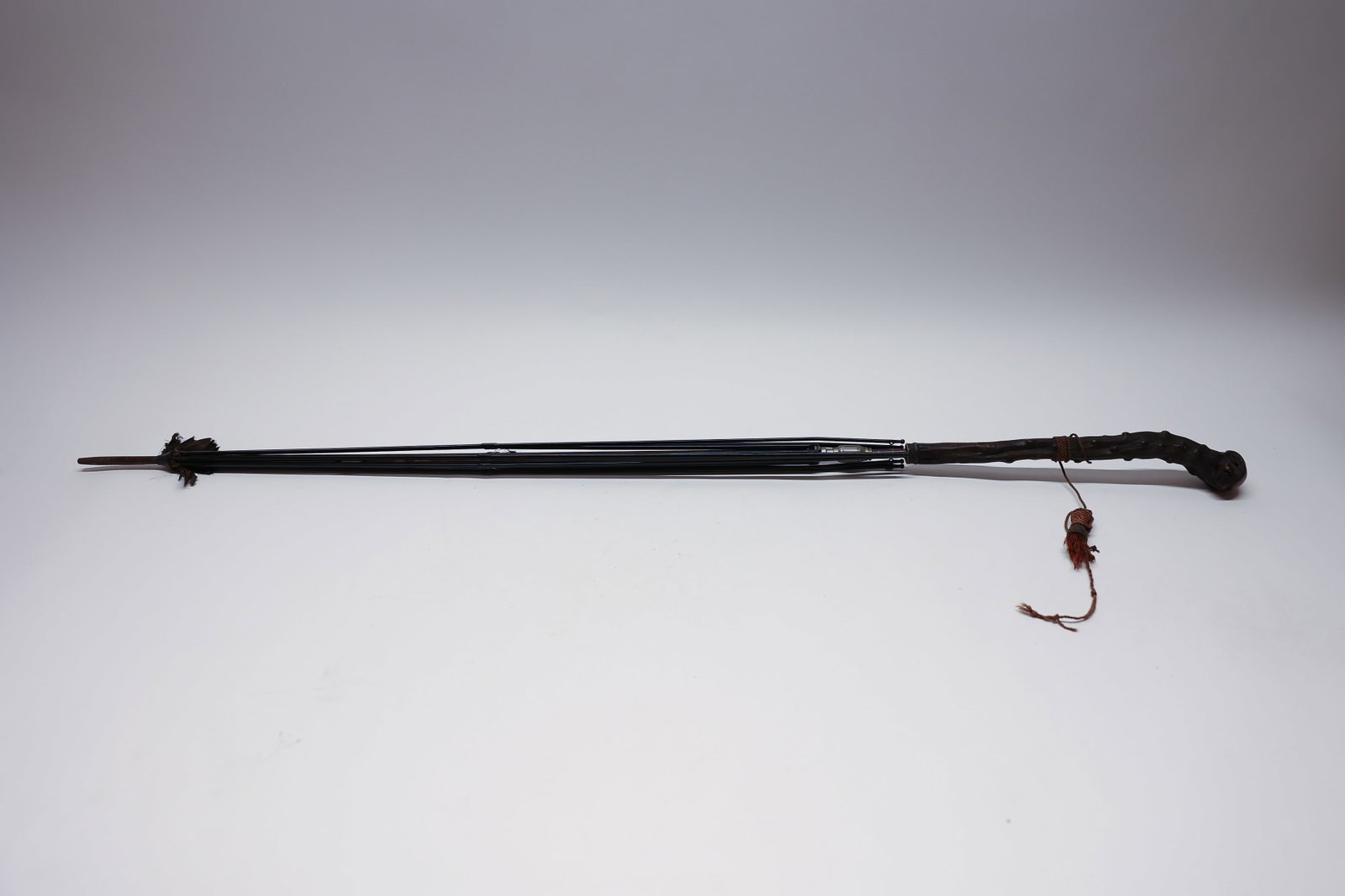 Umbrella Frame withSilver Monogram and Root Handle: 36" long. An antique umbrella frame featuring a distinctive knotted, gnarled wood handle with a rich dark patina, wrapped in cord binding near the shaft. A silver-tone metal collar sits below the hand