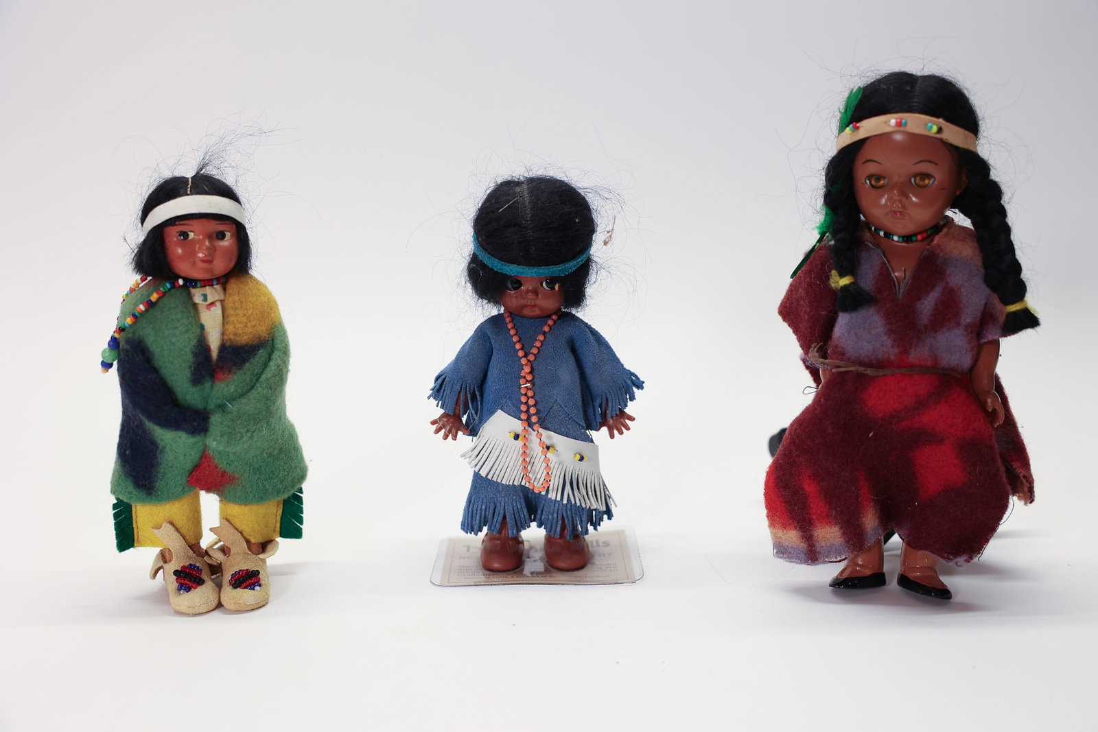 Lot of 3 Dolls: 3 Native American style plastic dolls. 6" - 7.5" tallDimensions: H: 7.5", W: 3", L: 8"