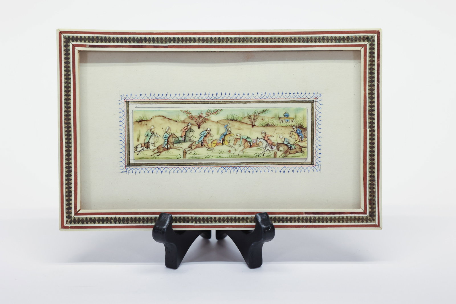 Persian/Mughal Style Miniature Painting, Polo/Hunt: Fine hand-painted miniature depicting a lively equestrian scene, likely a polo match or mounted procession, in the Persian or Indo-Persian (Mughal) miniature painting tradition. This style of miniatur