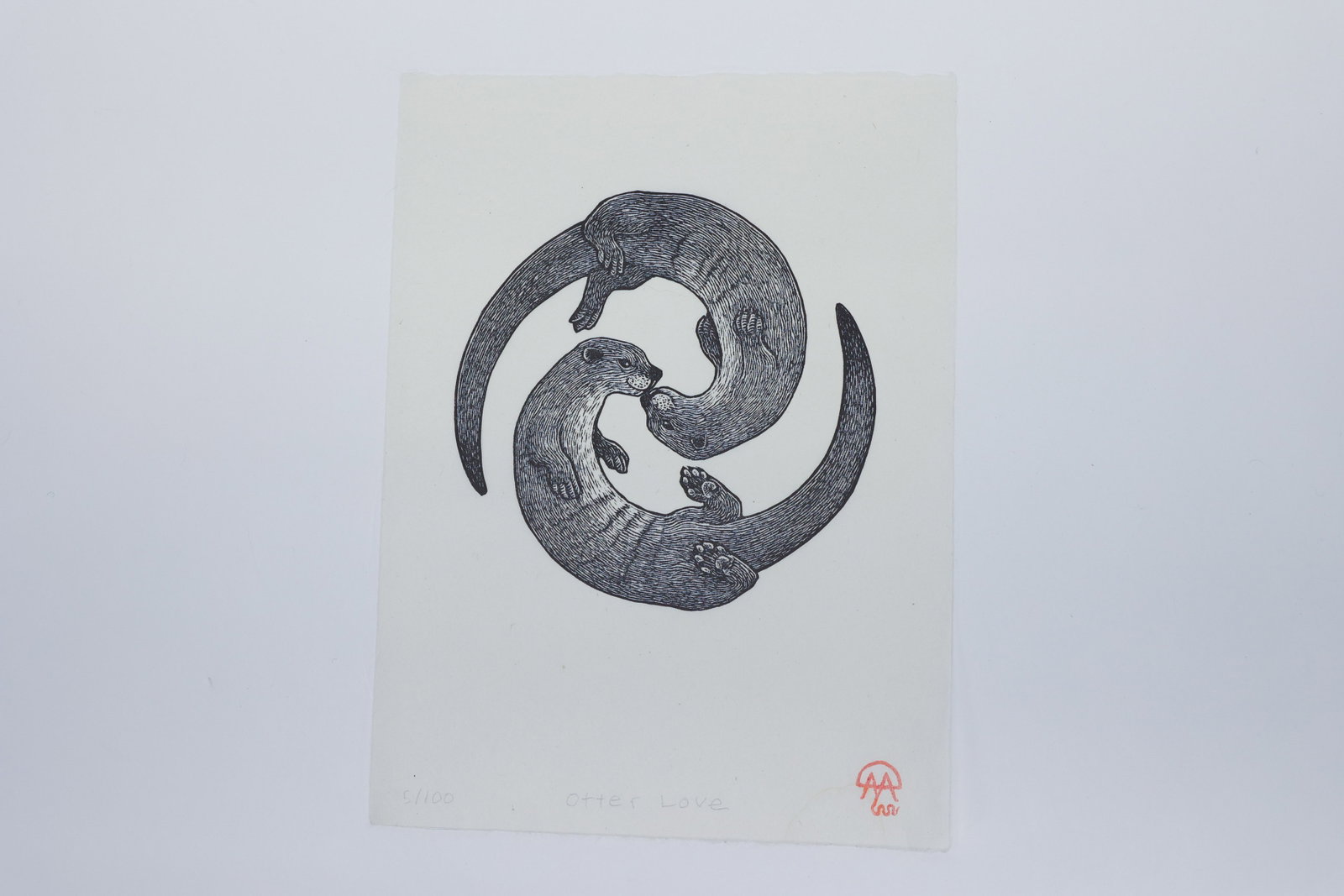 "Otter Love" Signed Relief Print Anomal Press: Hand-carved relief print titled "Otter Love" by David Miles Lusk of Anomal Press, a Missoula, Montana printmaker known for detailed nature-inspired relief work. The print depicts two river otters inte