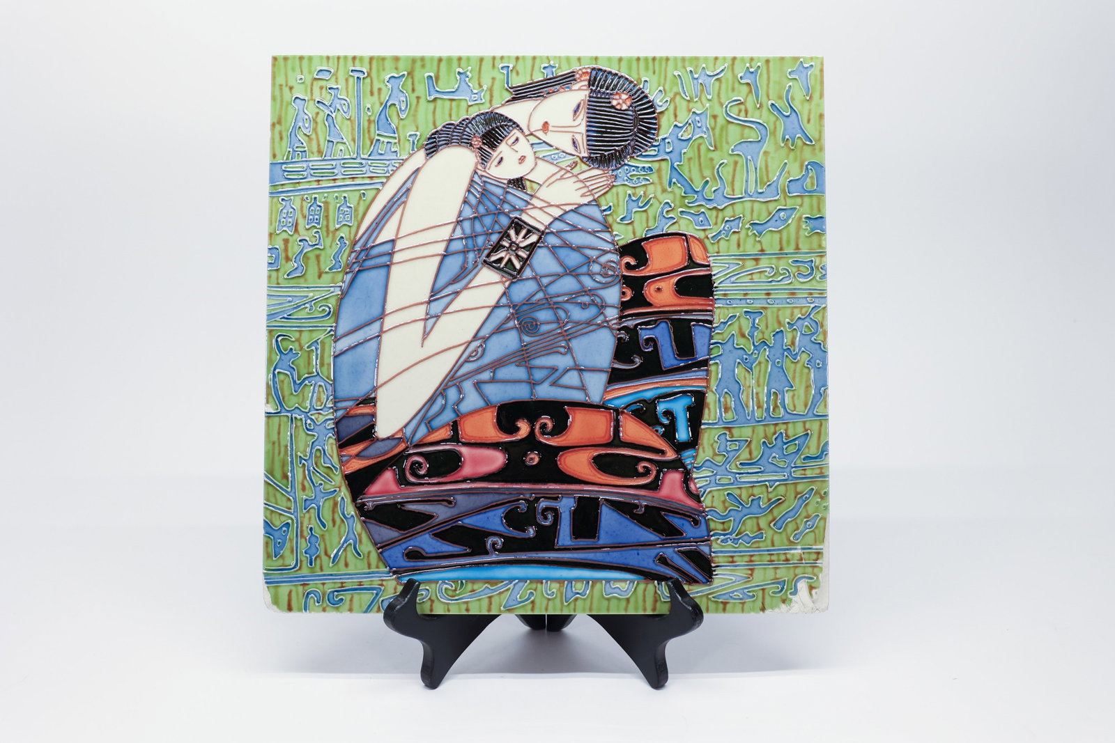 Ceramic Tile, After Ting Shao Kuang "Motherhood": 3D raised-relief ceramic tile interpretation of Ting Shao Kuang's "Motherhood," featuring the artist's signature stylized figures rendered in raised cuerda seca-style outlines filled with rich blue, o