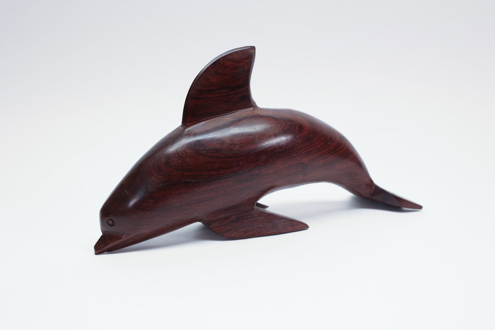 Mexico Folk Art Carved Ironwood Dolphin: Dimensions: H: 6", W: 3.25", L: 11.5"