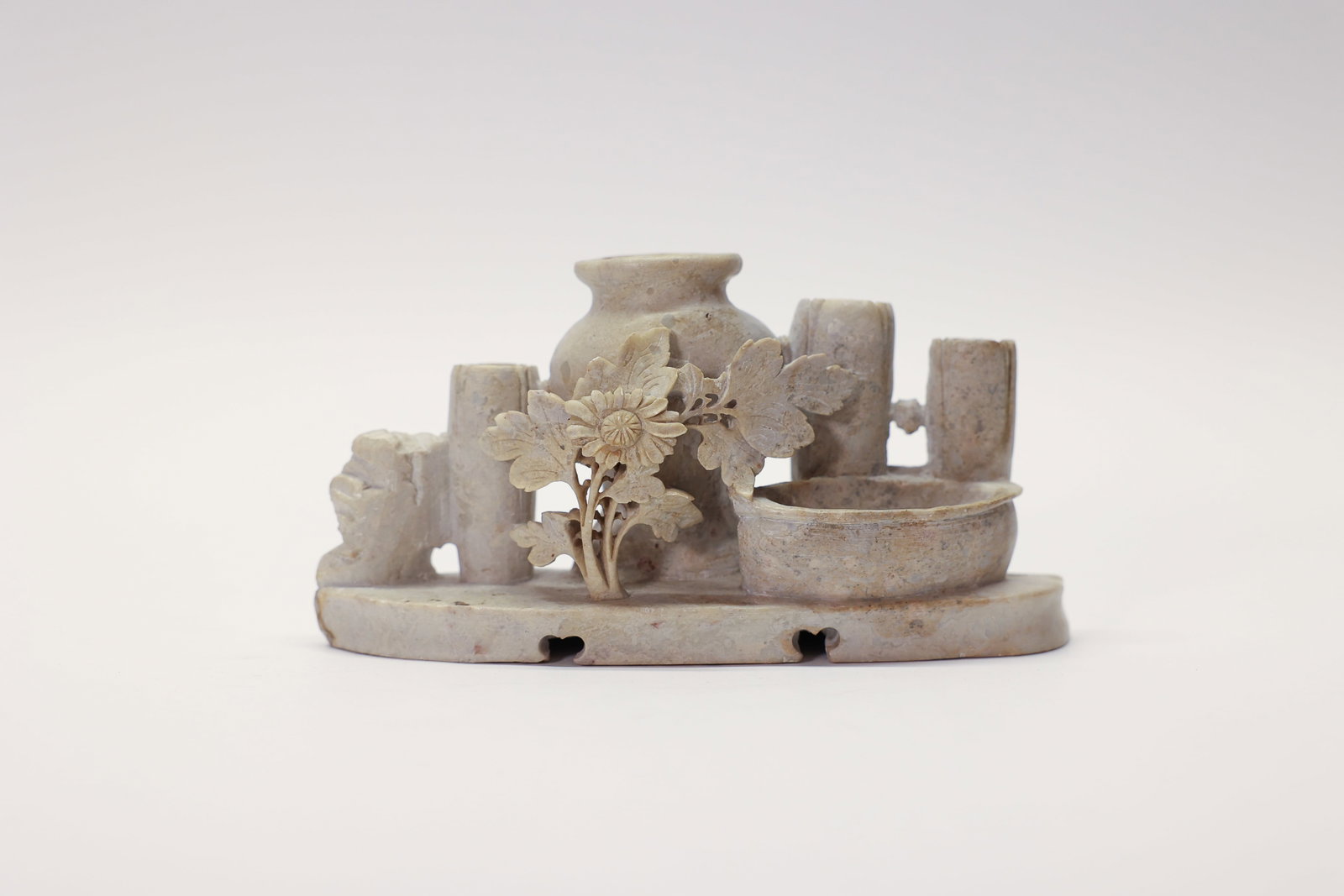 Chinese Carved Soapstone Ink Well & Brush Holder: Soapstone pot, hand carved, 6 1/4 inches long 3 1/4 inches tall.Dimensions: H: 3.25", W: 6.25", L: 2"