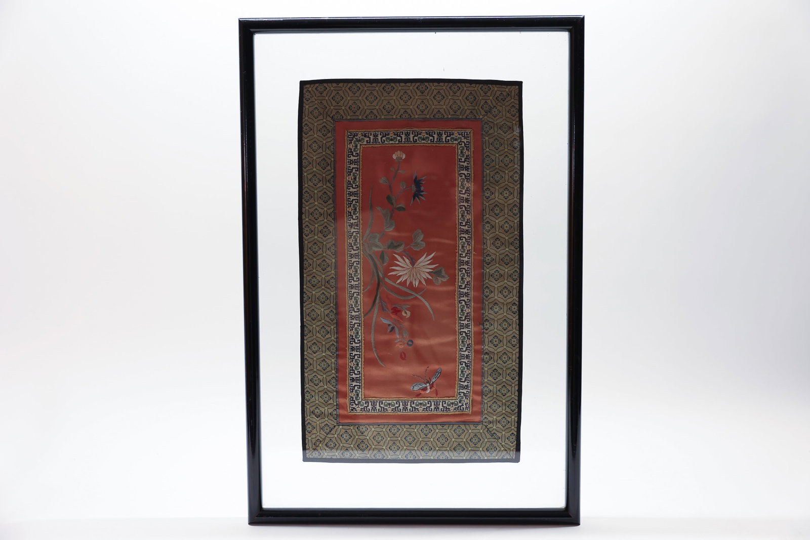 Chinese Silk Embroidery, Flowers & Butterfly: Vintage Chinese embroidery of flowers with a butterfly and a lovely double border. Silk. The back includes a label: number 13 made in China. Frame size 22 x 14 inches, the fabric is 16 1/2 x 9 1/2