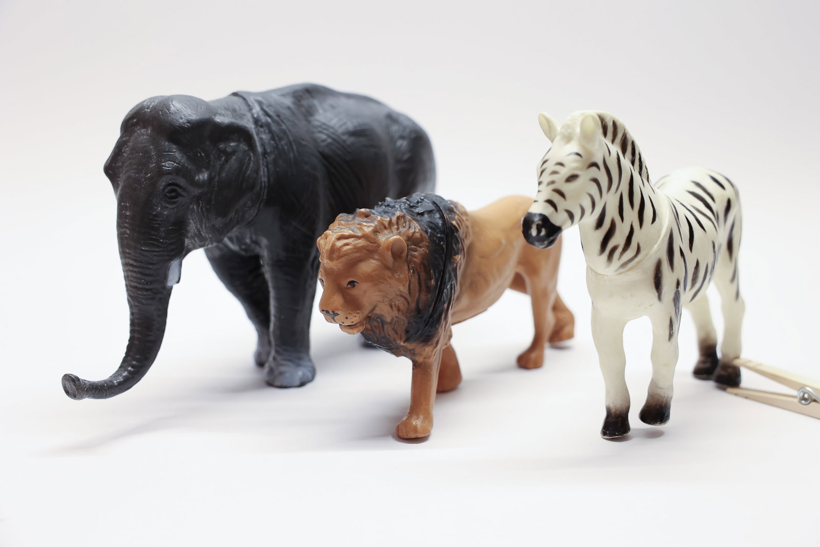 Marvel Trading Corp Hong Kong Plastic Safari Toys: Lot of three vintage plastic African safari animals, elephant, zebra and lion. Made in Hong Kong by the Marvel Trading Corporation. Elephant is 10 inches long 6 inches tall zebra is 7 inches long 6 in