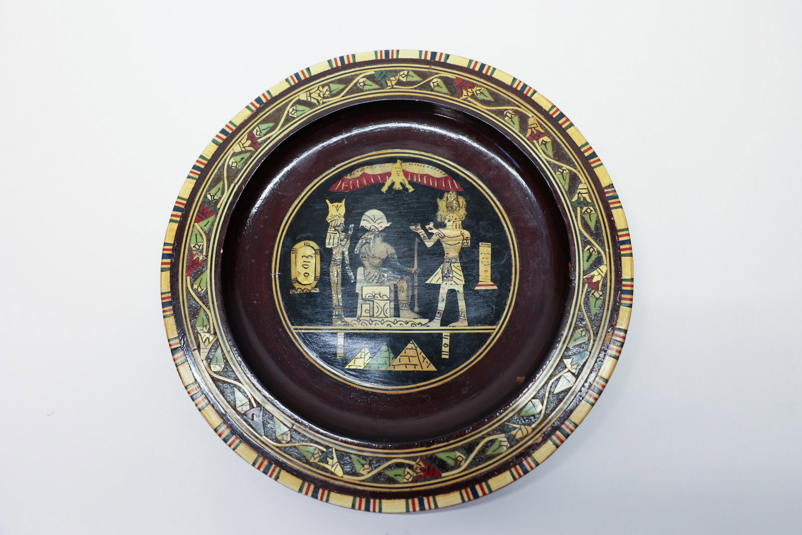 Egyptian Mother-of-Pearl Inlay Souvenir Plate: Handmade with intricate mother of pearl and wood inlay.Egyptian RevivalDimensions: H: 0.75", W: 8.25"