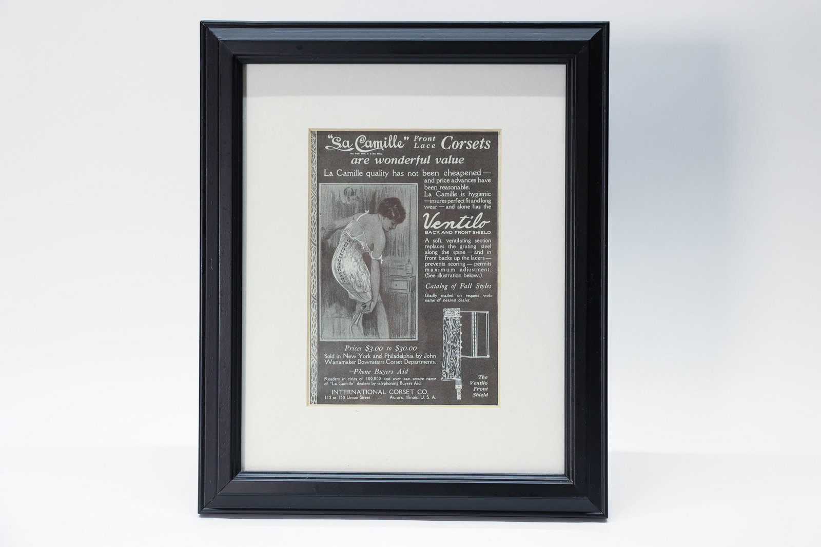 La Camille Corsets Advertisement, 1920s: Vintage advertisement for "La Camille" Front Lace Corsets, manufactured by the International Corset Co. based in Aurora, Illinois. 1920s. 8 x 10”.Dimensions: H: 10", W: 8"