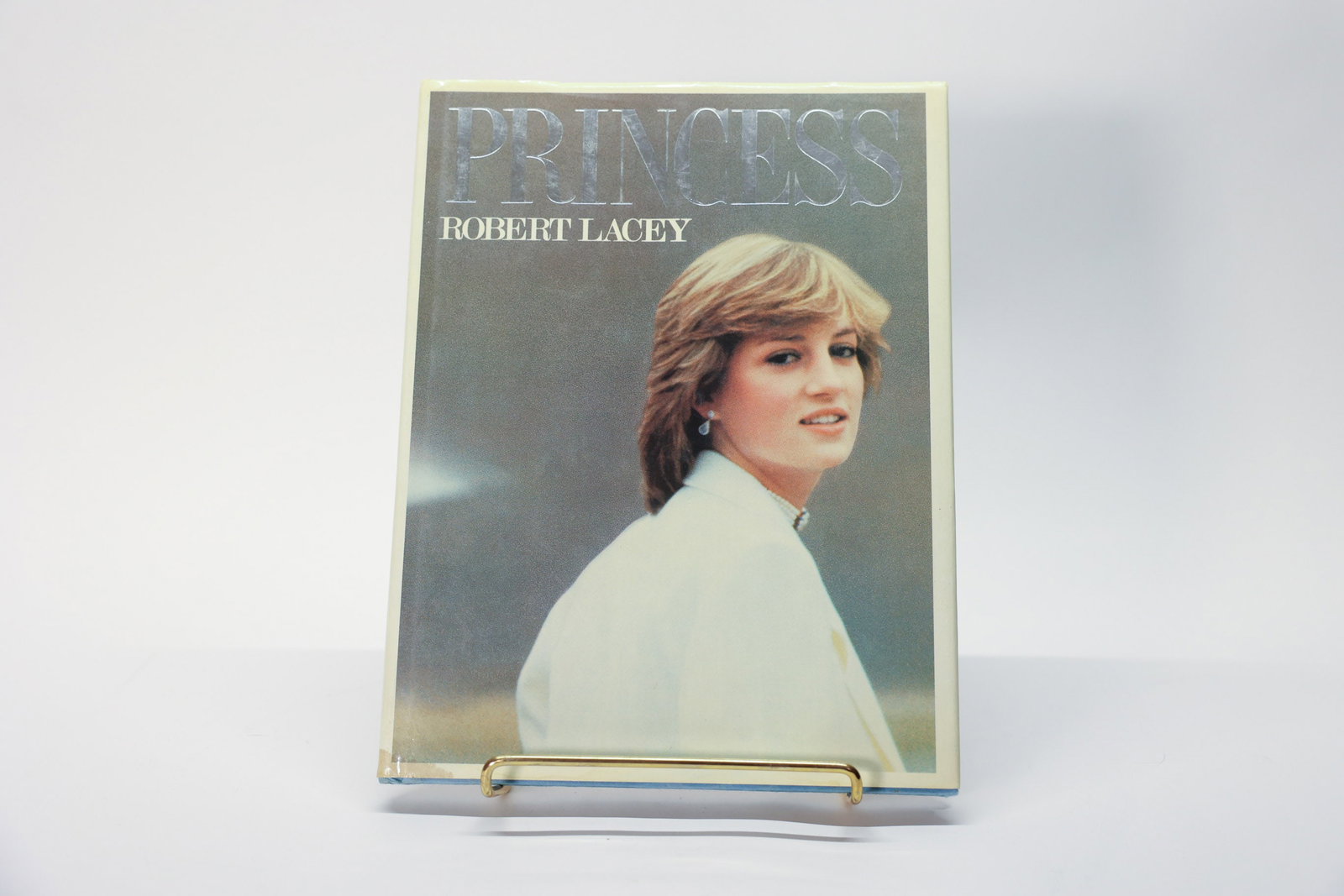 Princess by Robert Lacy: Color photos and biographical information about Princess Diana. Hardcover book.Dimensions: H: 11", W: 8.5", L: 0.75"