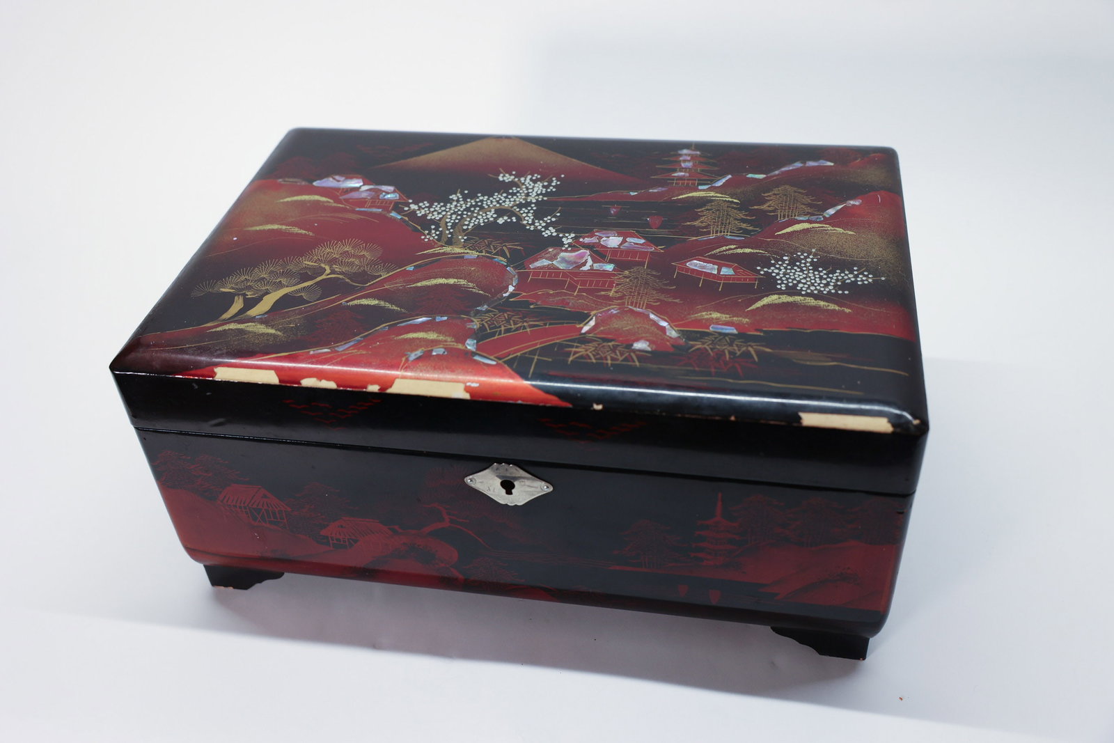 Japanese Lacquer Musical Jewelry Box, Large: Works! See photos for condition report, some loss of lacquer. 13” long x 8 1/2 wide x 6” tall.Dimensions: H: 6", W: 8.5", L: 13"