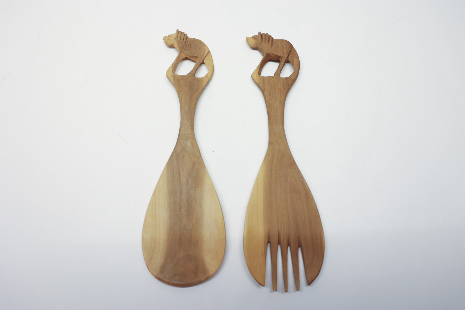 Hand-Carved Wood Lion Salad Servers: Lions. Good vintage condition.Dimensions: H: 12", W: 3.5", L: 1"