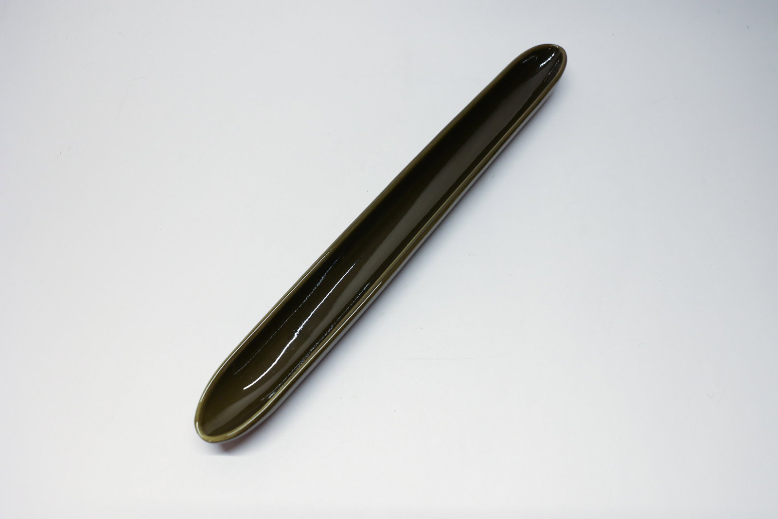 Bizzirri Olive Tray: Ceramic, made in Italy. Excellent condition.Dimensions: H: 16.25", W: 2", L: 1"