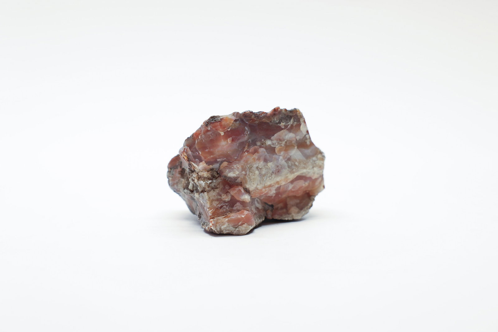 Carnelian Chalcedony Quartz Specimen: Chalcedony quartz. 4x2 1/2"Dimensions: H: 2.5", W: 4", L: 2"