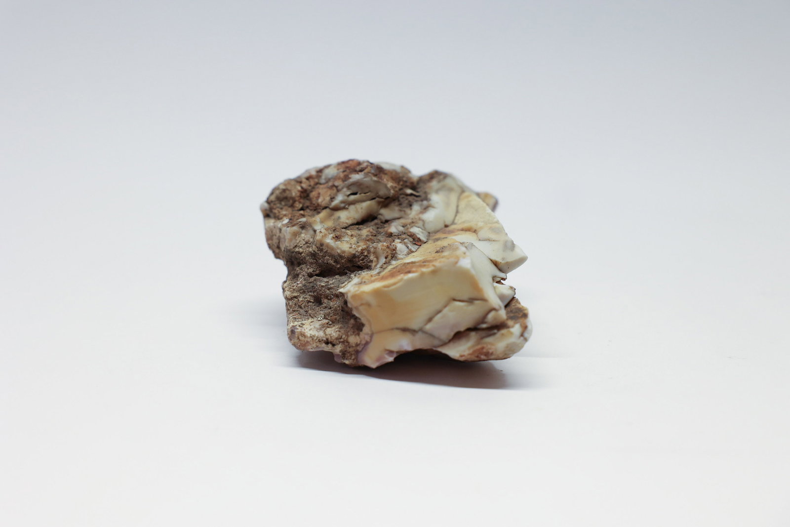 Mineral Specimen, Possibly Rough Opal: Possibly rough natural opal. 4 1/2 x 3 1/2 x 2".Dimensions: H: 3.5", W: 4.5", L: 2"