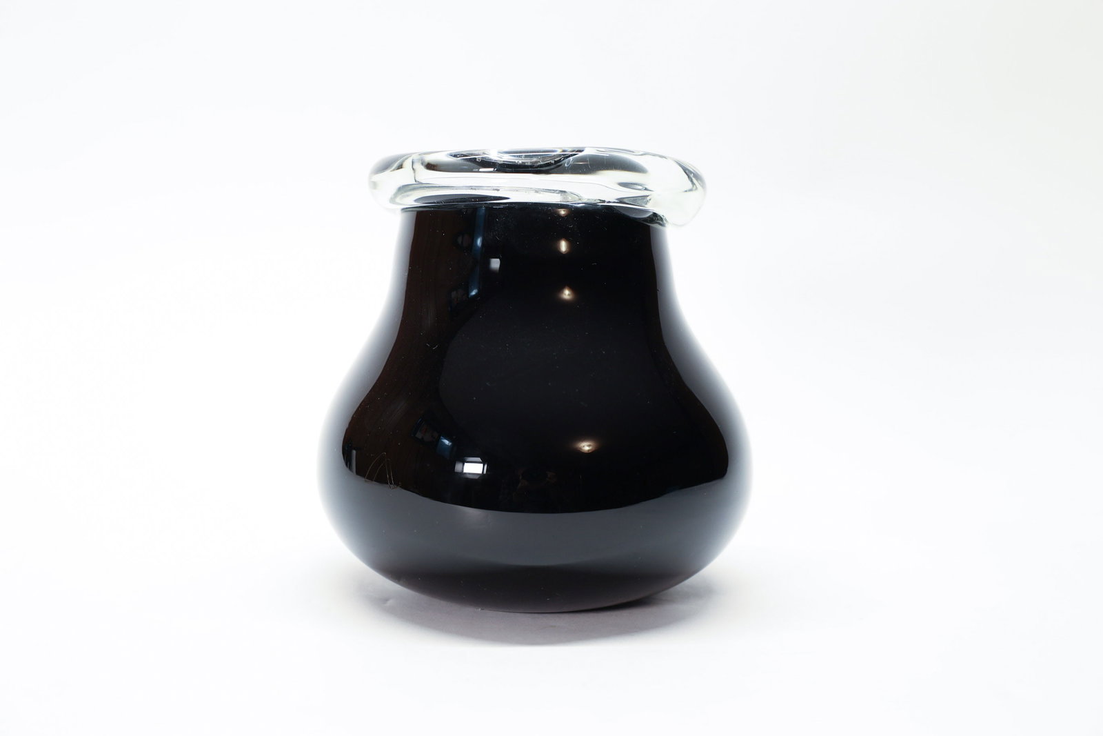 Painted Black Glass Vessel: 5 1/2" tall.Dimensions: H: 5.5", W: 4"