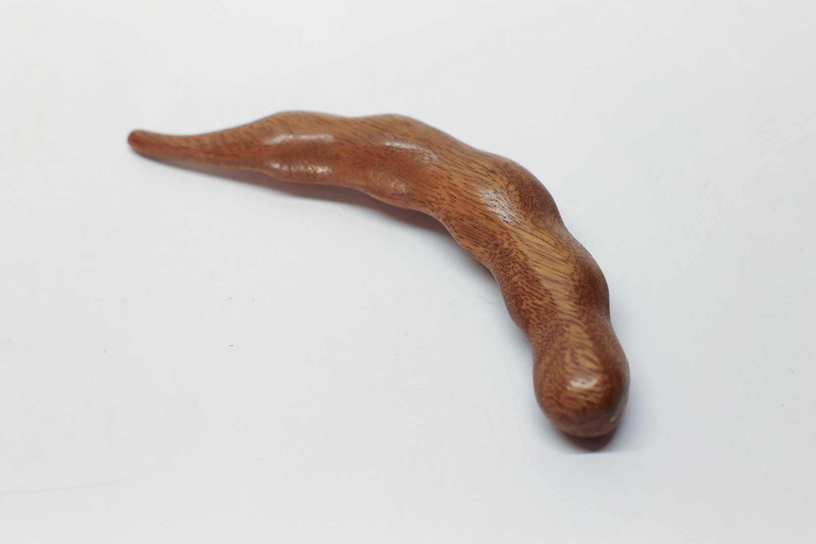 Hand-Carved Wooden Fava Bean Pod, Mid-Century: Very nice. 6 3/4" long. Mid century.Dimensions: H: 3", W: 6.75", L: 1"