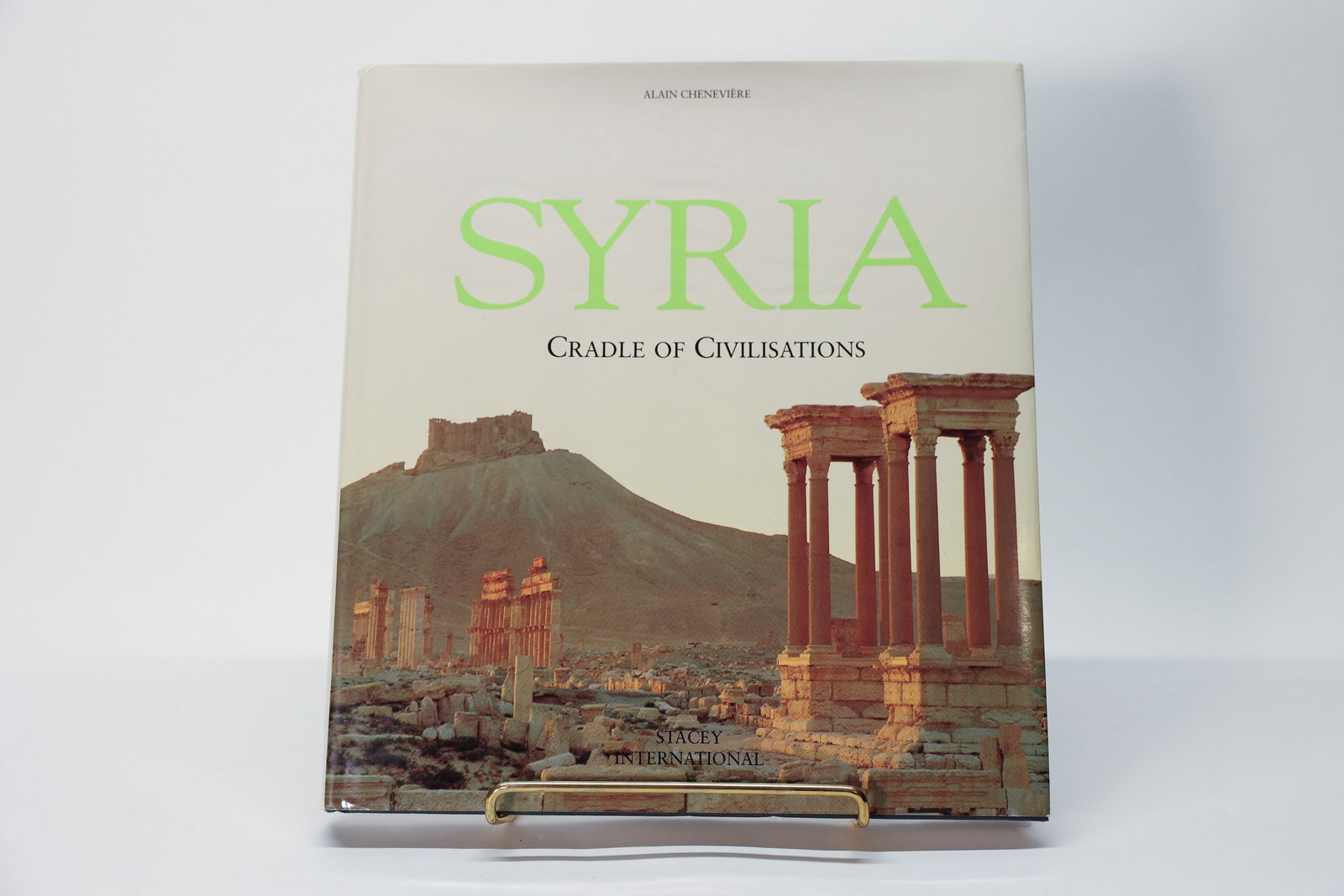 Syria: Cradle of Civilisations by Alain Cheneviere: By Alain Cheneviere and published by Stacey International. 1996. Hardcover book.Dimensions: H: 11.5", W: 10.5", L: 1"