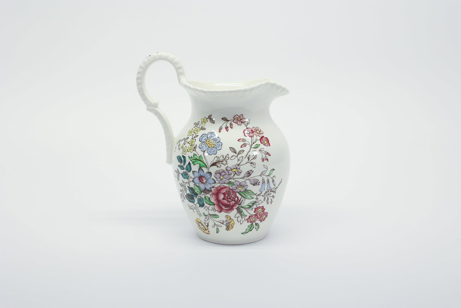 Vintage Copeland Spode "Romney" Floral Ceramic Pit: Beautifully crafted small ceramic pitcher by the historic English manufacturer, Copeland Spode, featuring the highly collectible "Romney" pattern. 6" tall. This classic piece showcases a vibrant, mult