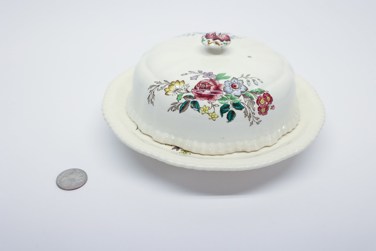 Copeland Spode "Romney" Covered Muffin Dish: Round earthenware covered muffin dish in Copeland Spode's "Romney" pattern, gadroon-edged base plate and domed lid with a floral finial, both transfer-printed in polychrome with a rose-centered