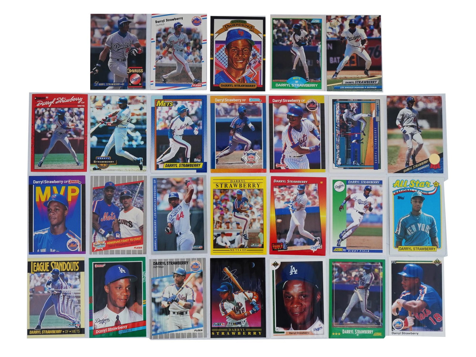 COLLECTION OF DARRYL STRAWBERRY BASEBALL CARDS: Mixed lot of Darryl Strawberry baseball sports cards.Companies Included are Topps, Donruss, Score, Upper Deck, and more.Featured Player is Darryl Strawberry.Cards are in penny sleeves and/or top