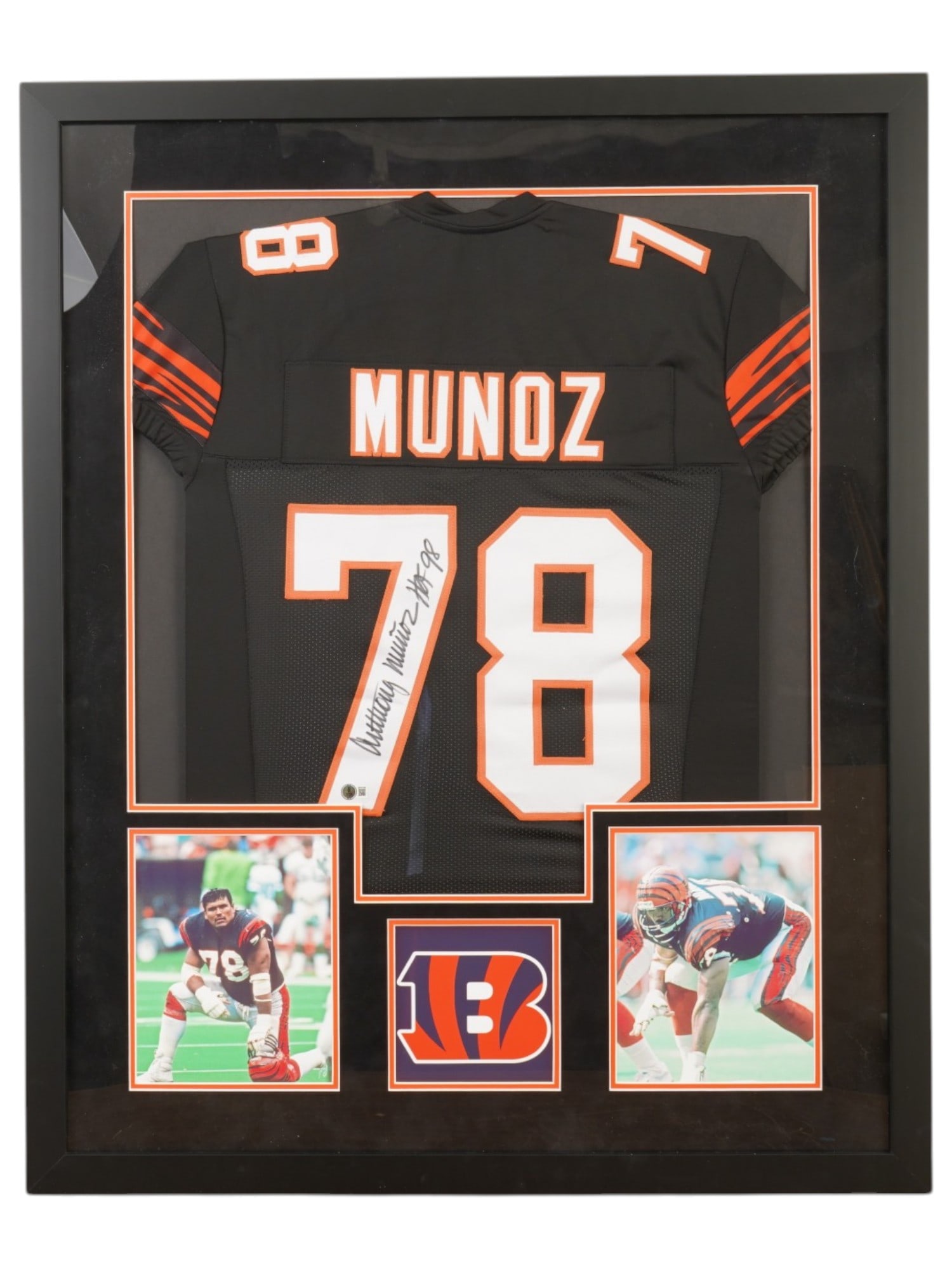 FRAMED ANTHONY MUNOZ SIGNED BENGALS JERSEY BECKETT: This premier memorabilia centerpiece features a custom-framed Cincinnati Bengals jersey hand-signed by legendary offensive tackle and 1998 Pro Football Hall of Fame inductee Anthony Munoz. Widely rega