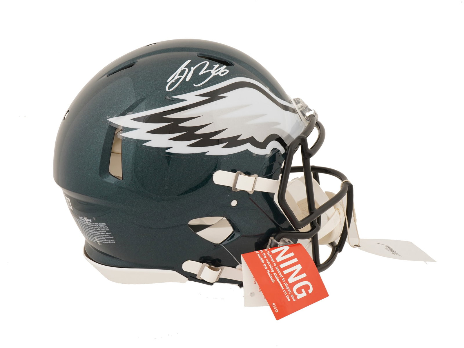 SAQUON BARKLEY SIGNED EAGLES FULL SIZE HELMET: This premier lot features a Riddell full-size Philadelphia Eagles helmet, hand-signed by the explosive superstar running back, Saquon Barkley. After joining the Eagles in 2024, Barkley authored a camp