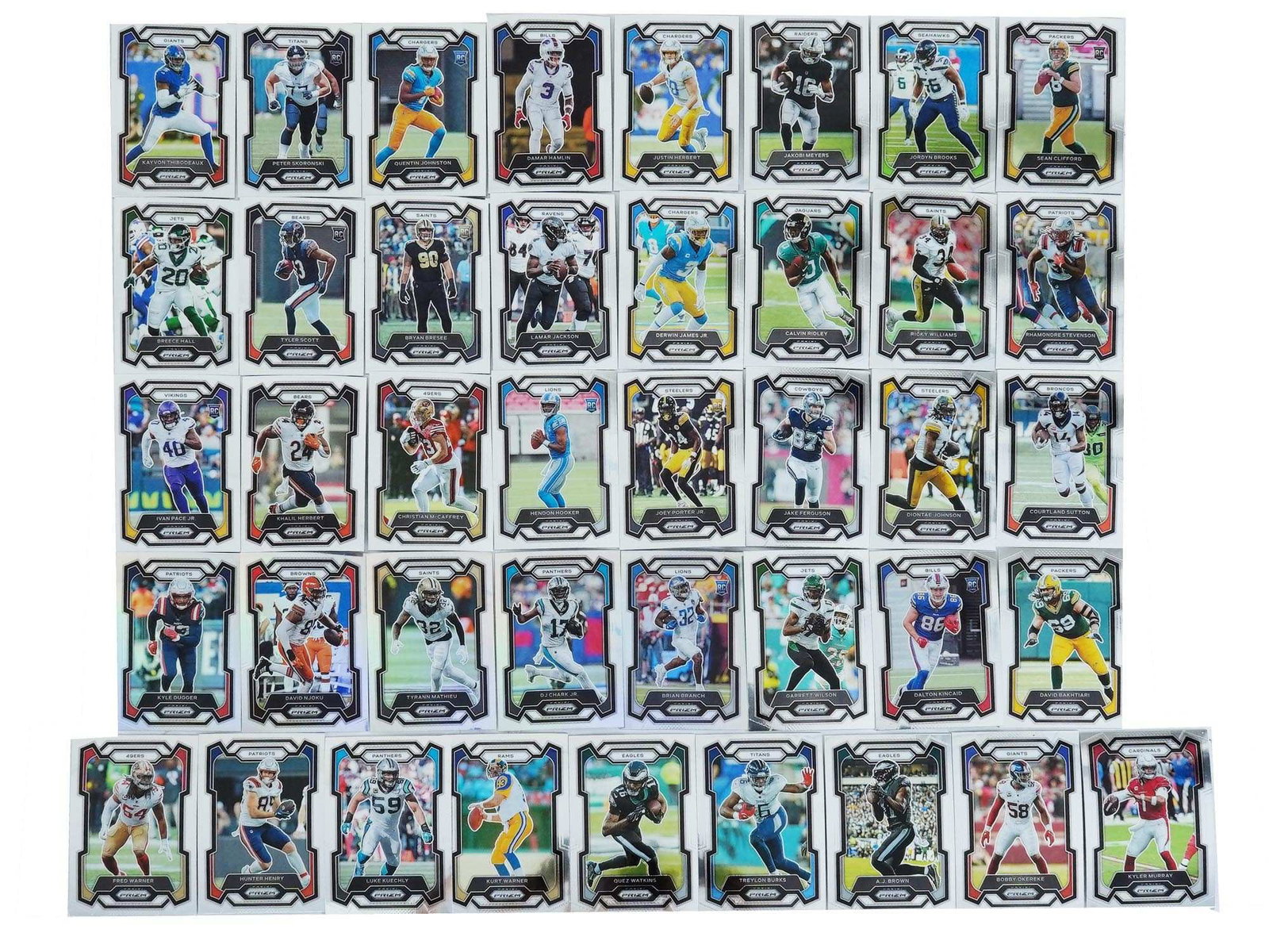 2023 PANINI PRIZM NFL CARDS: A must-have for football card collectors and Prizm enthusiasts! This lot features 2023 Panini Prizm NFL cards, known for their stunning chrome finish, bold designs, and sought-after rookie class. Whet